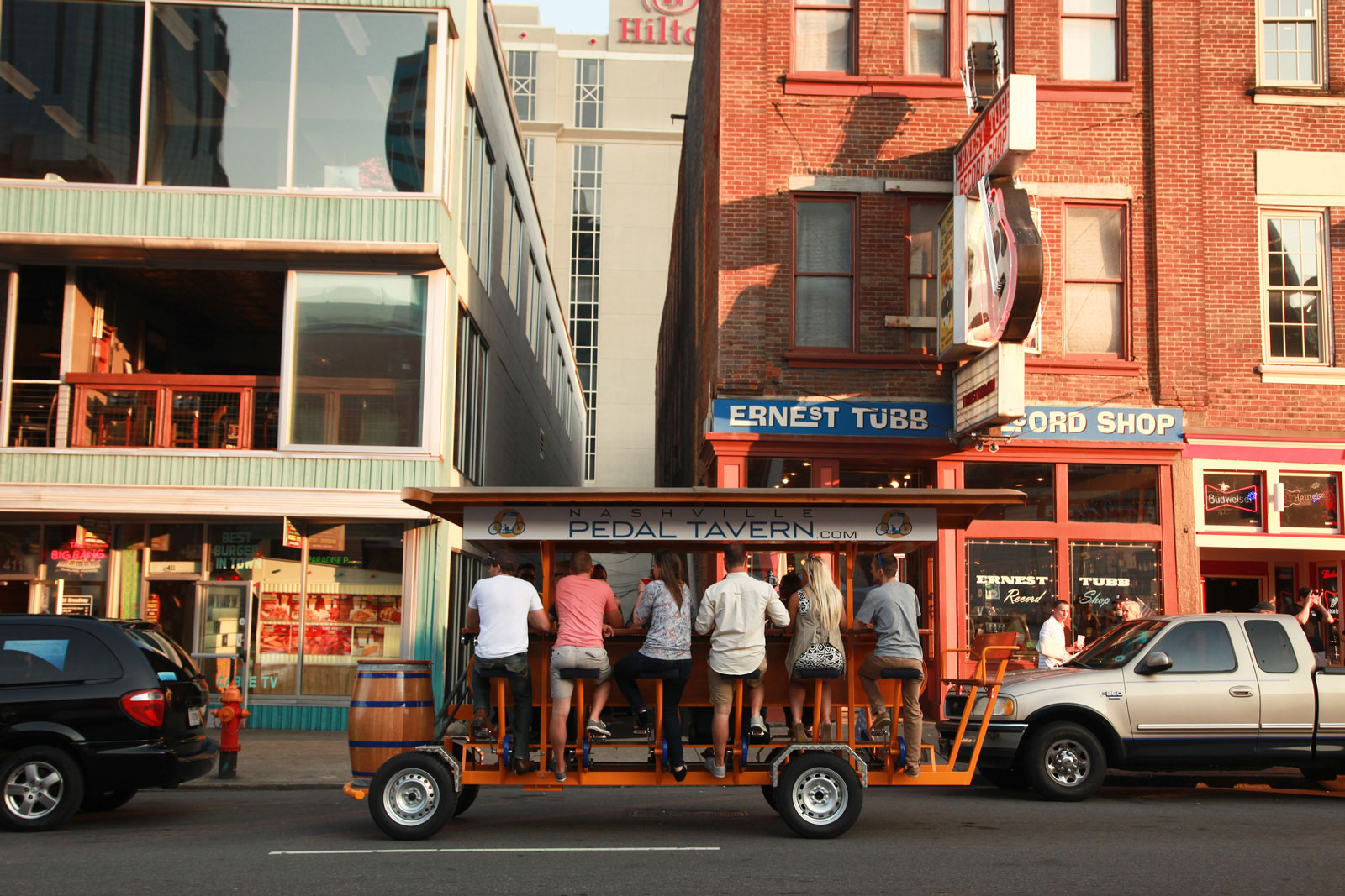 Pedal Tavern Boat moving through downtown Nashville - fun things to do in nashville, nashville attractions, nashville tourist attractions