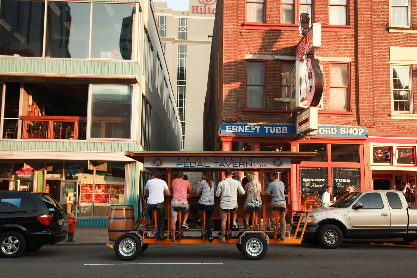 Pedal Tavern Boat moving through downtown Nashville - fun things to do in nashville, nashville attractions, nashville tourist attractions