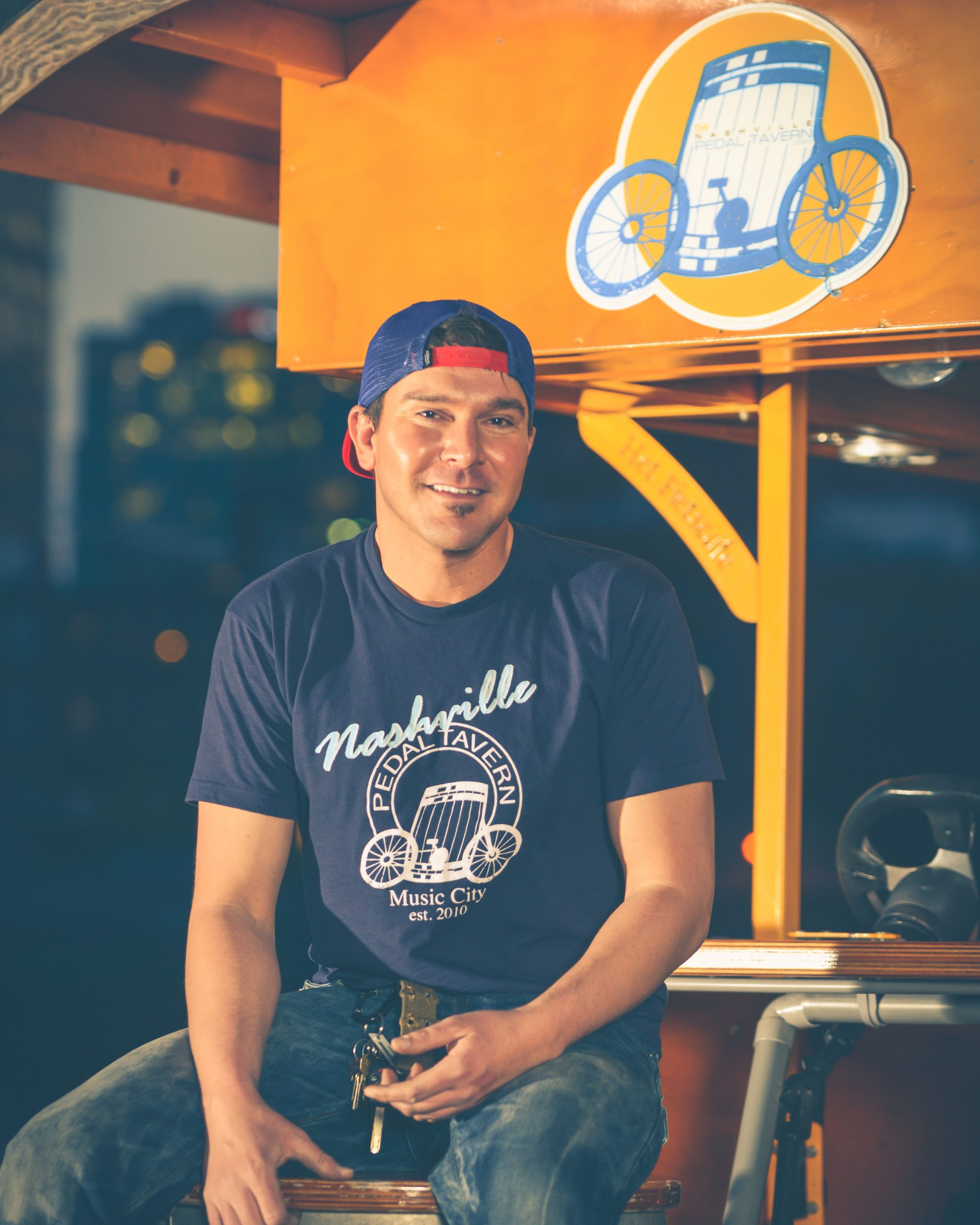 Cloud sitting in front of a Pedal Tavern boat.