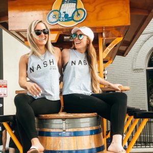 Girls repping The Nash Collection t-shirts on the Pedal Tavern party bike