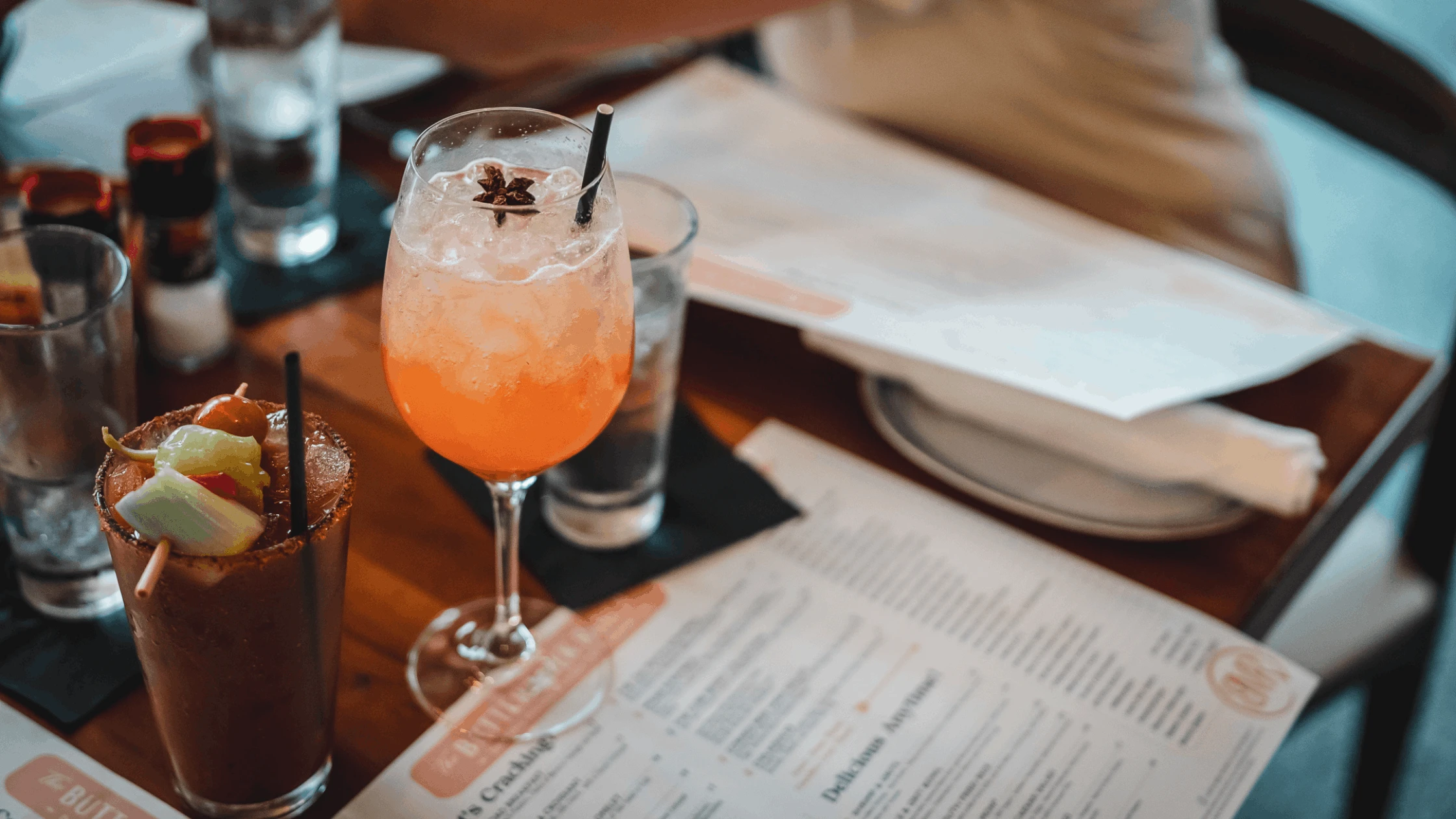 a bloody mary and a mimosa at a galentines day brunch