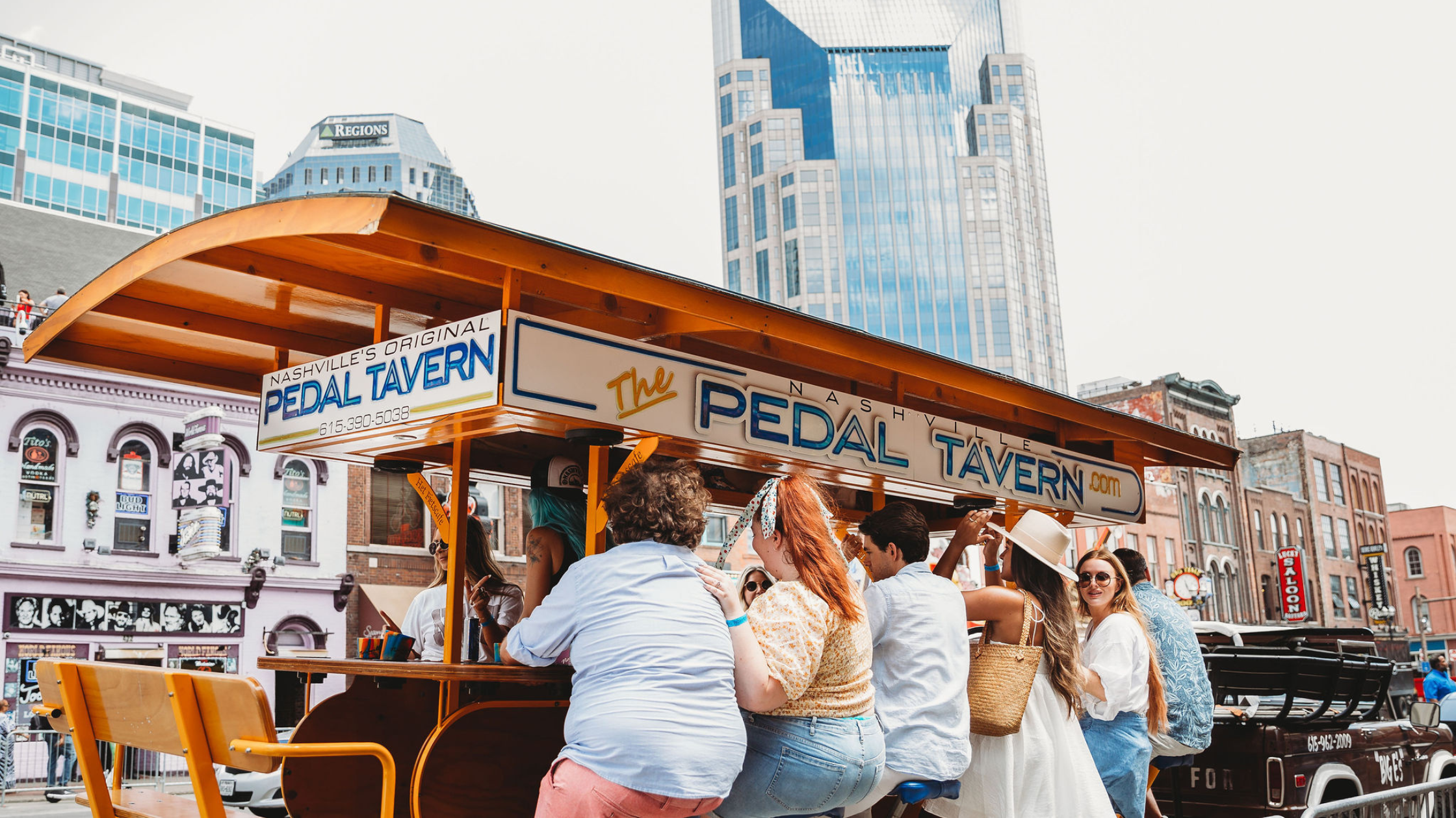 nashville pedal tavern car with 7 people enjoying their staycation